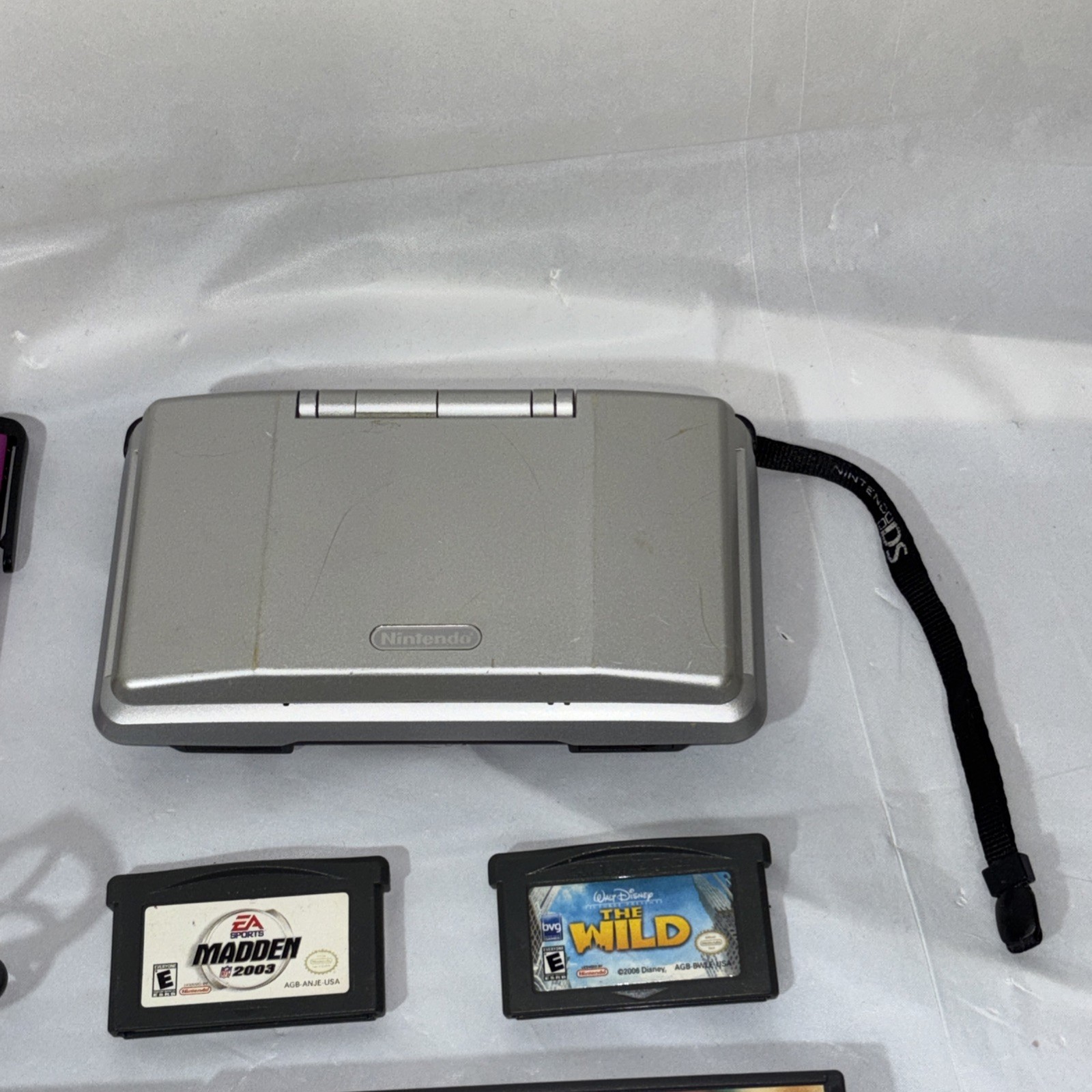 Nintendo DS Silver Handheld System with Wrist Strap + 6 Games Tested and Working