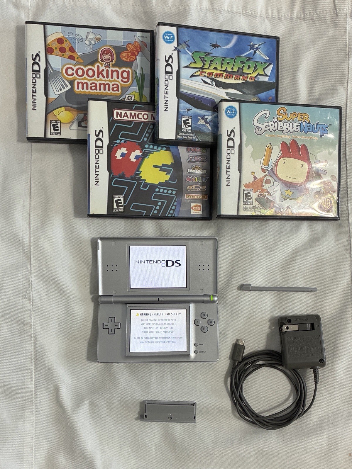 Nintendo DS Lite Silver w/ Charger & 4 Games
