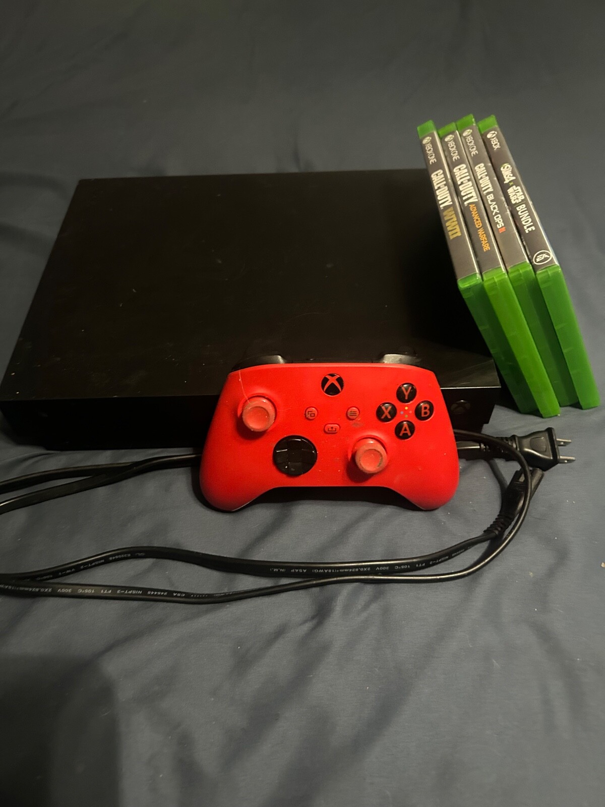 Microsoft Xbox One X 1TB Home Console – Black with 4 games