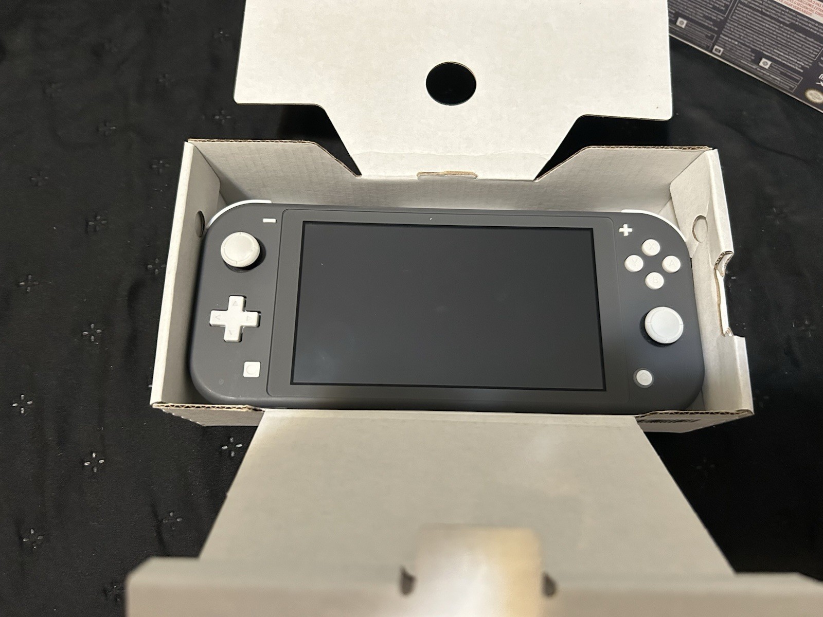 Brand New Nintendo Switch Lite In The Color Gray And Comes With Charger ￼