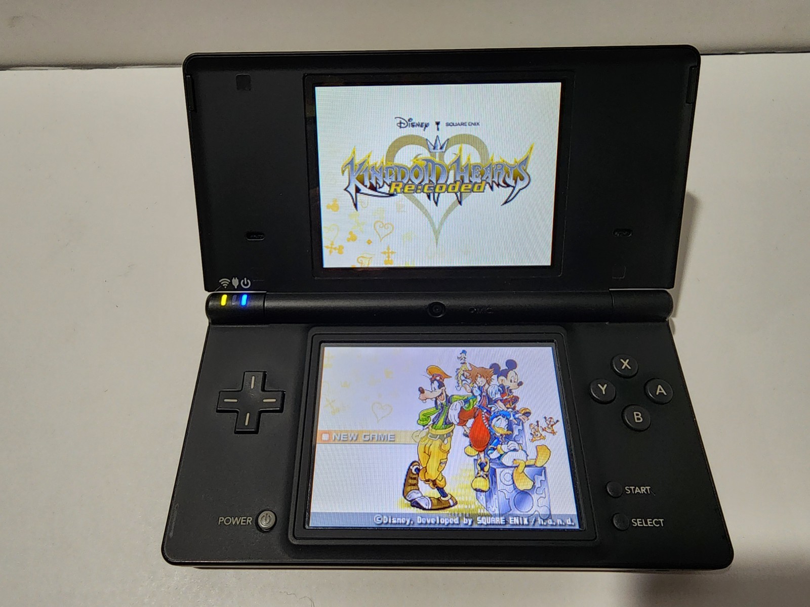 Nintendo DSi Launch Edition Black Handheld System with 7 Games