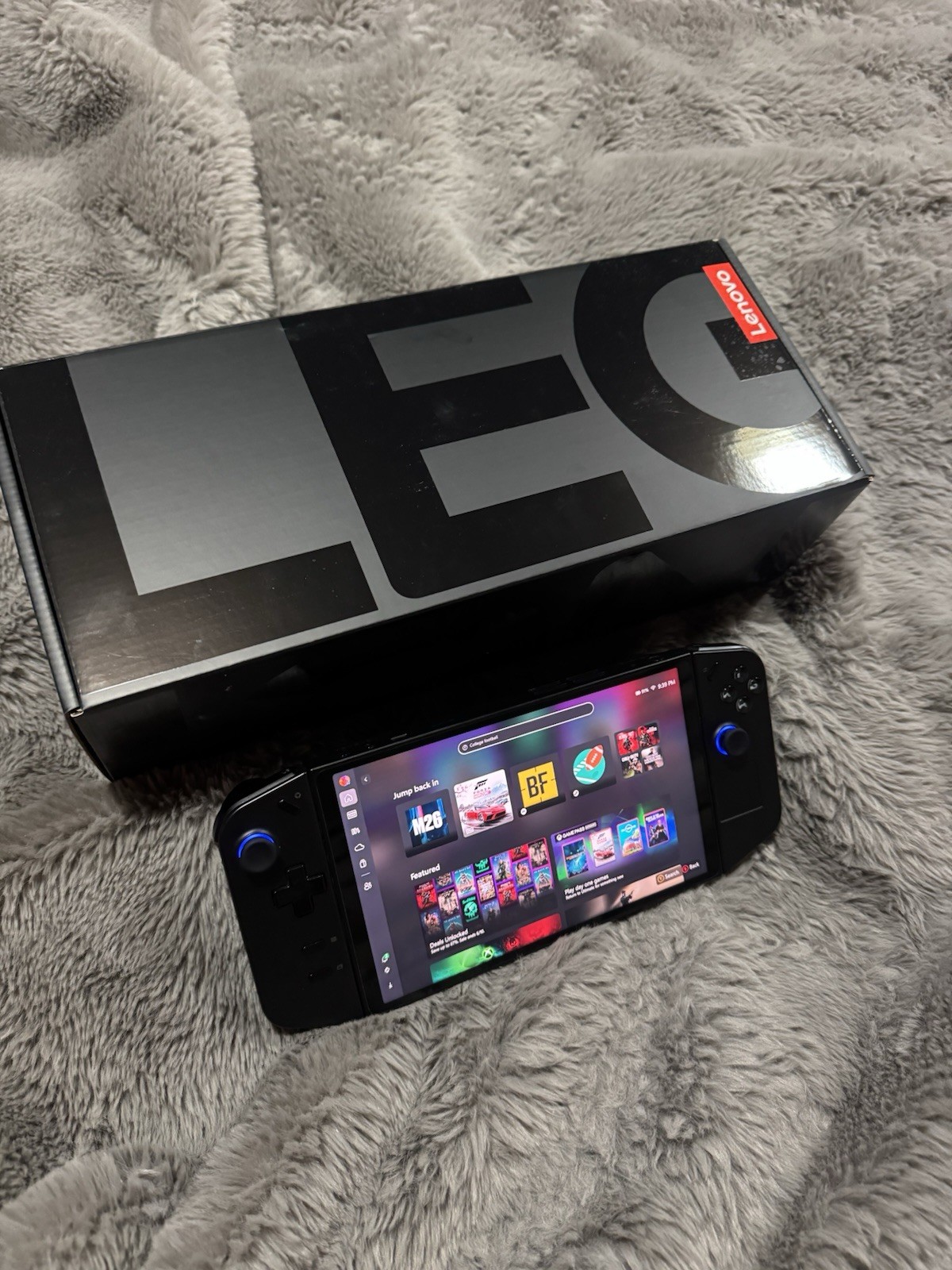 Lenovo Legion Go 1TB Handheld PC w/ Box, Travel Case, Charger, and Legion dock.