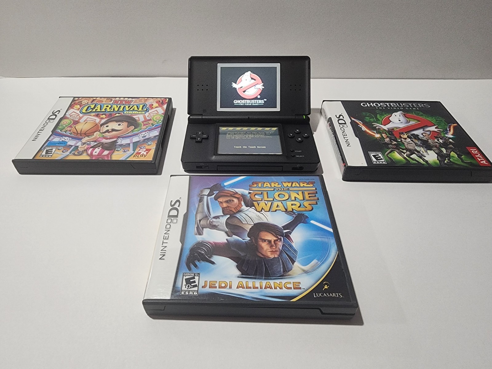 Nintendo DS Lite Handheld System – Onyx Black with 3 games
