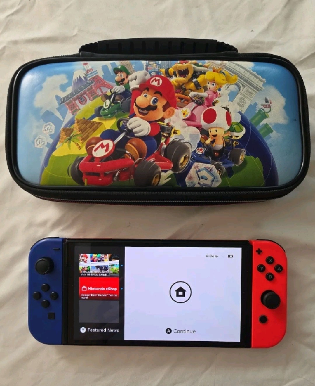 Nintendo Switch OLED W/ 128GB Micro SD Card And Mario Bros Case – T/W
