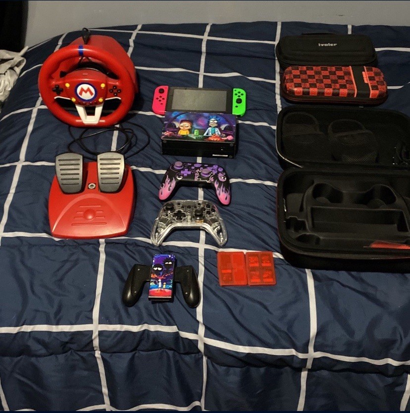 Nintendo Switch HAC-001(-01) with Blue and Red Joy-Con Controllers and Mario…