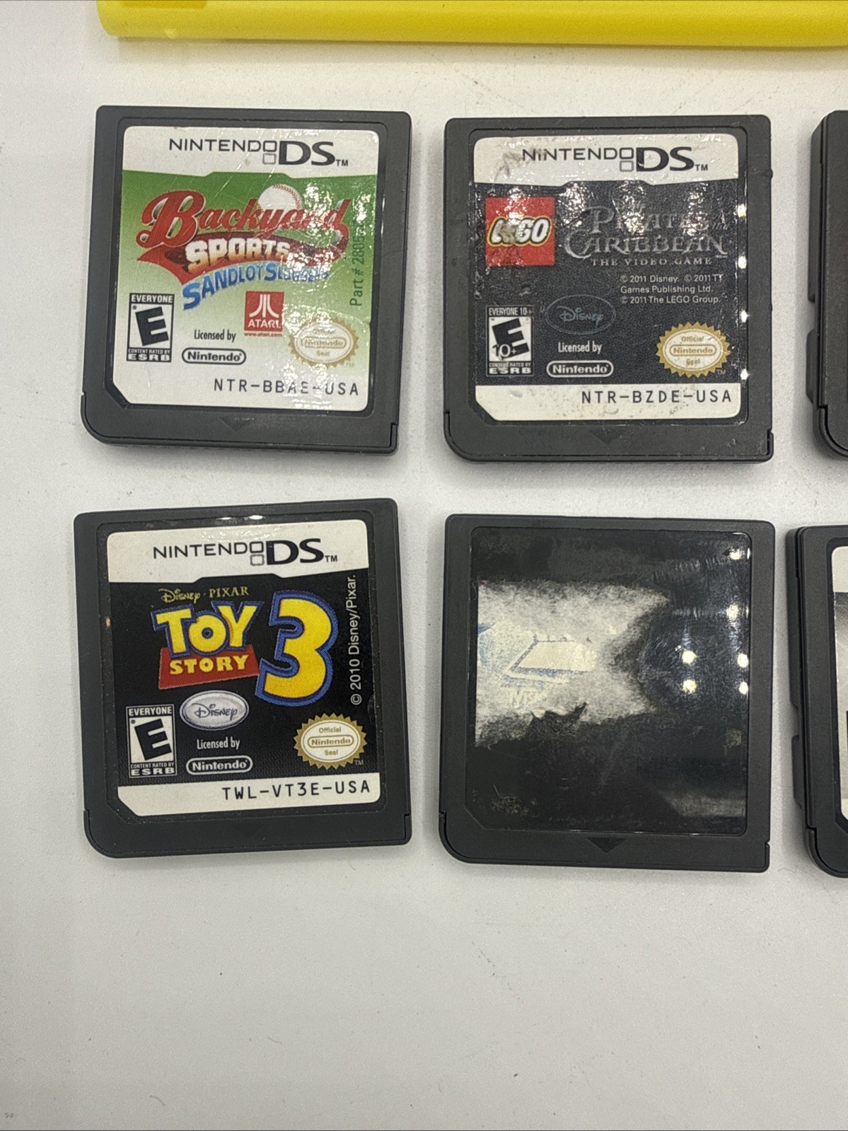 Nintendo DSI XL Handheld Console Bronze UTL-001 Bundle 8 Games, Charger, Stylus