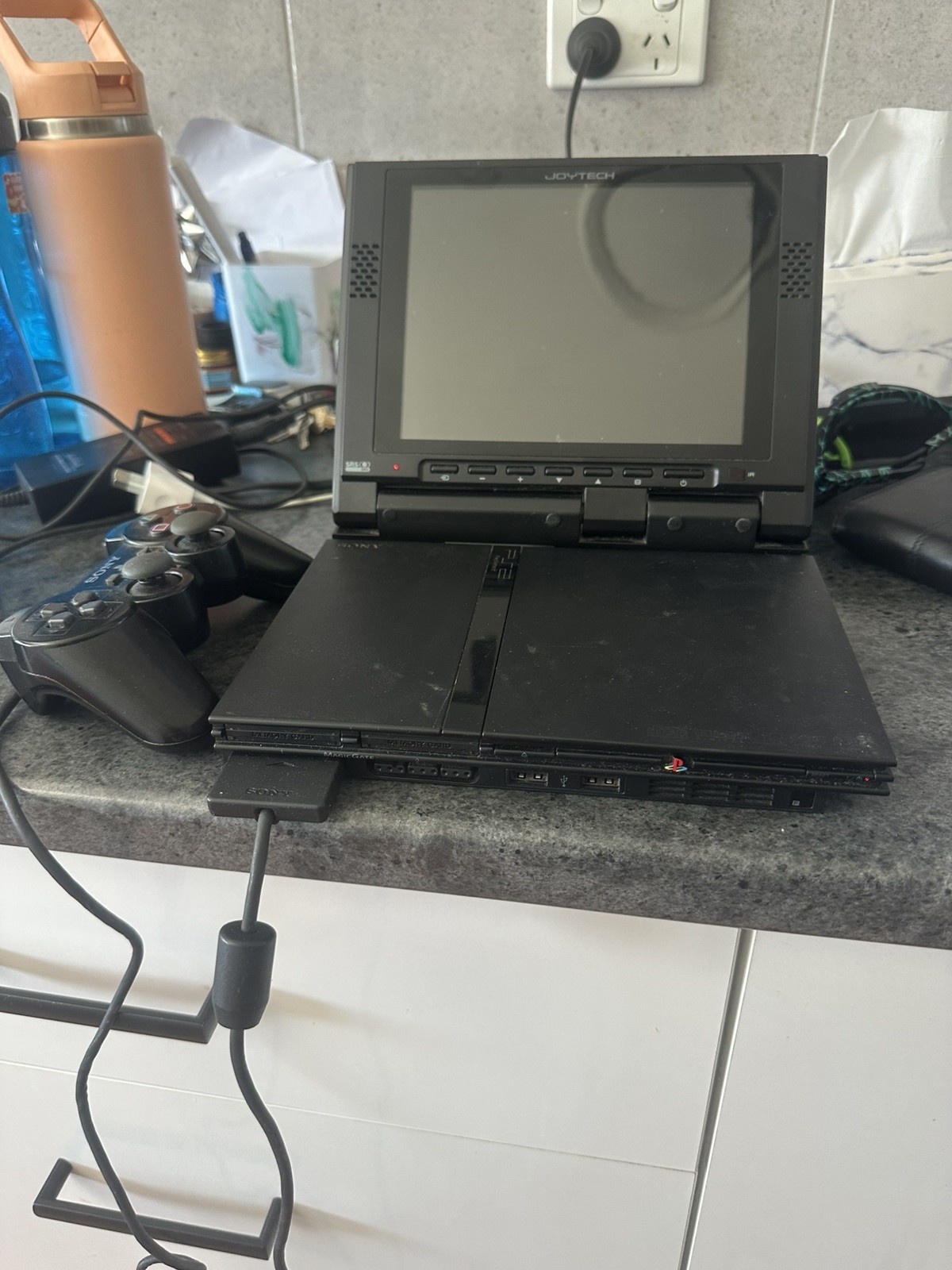 PlayStation 2 Slim Console black with joyteck 8inch screen and nfs most wanted