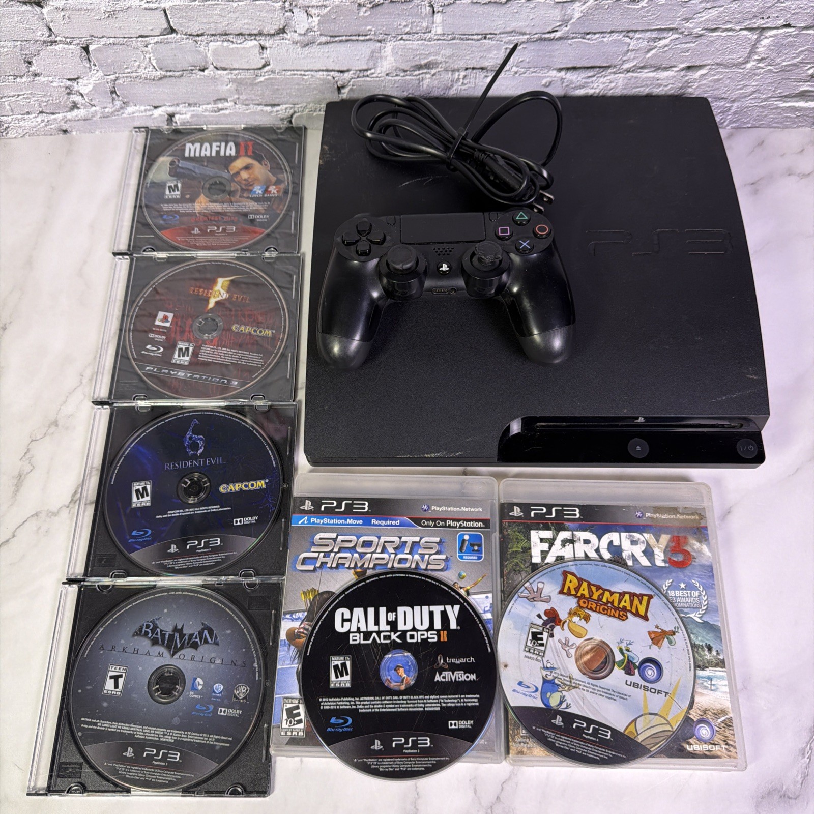 Sony PlayStation 3 Slim 160GB CECH-3001B, PS4 Controller & 8 Games – Tested ✅