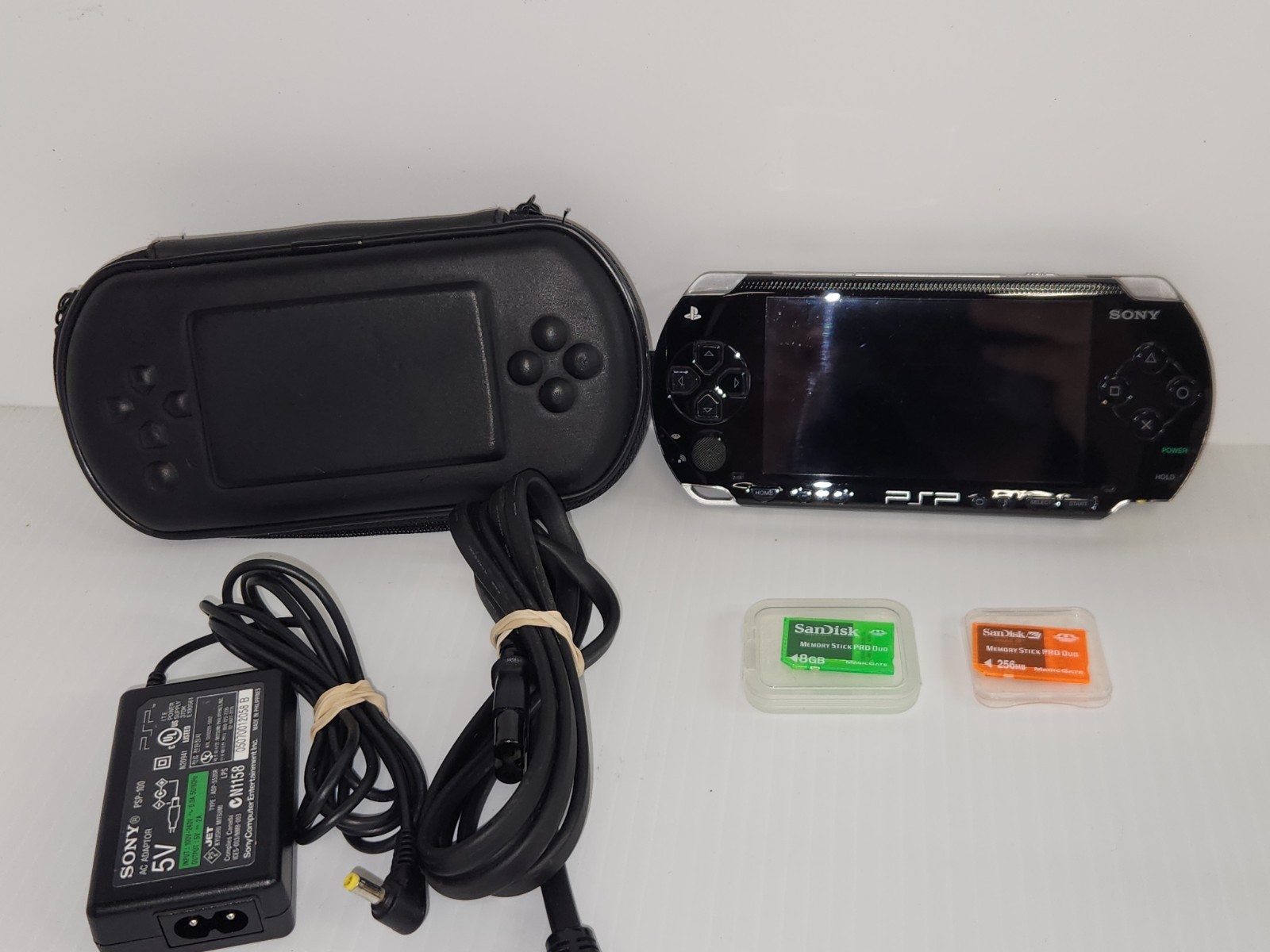 Sony PSP Handheld Video Game System Tested W/charger / No BATTERY. Excellent CON