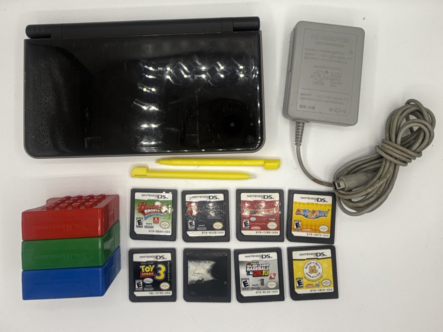 Nintendo DSI XL Handheld Console Bronze UTL-001 Bundle 8 Games, Charger, Stylus