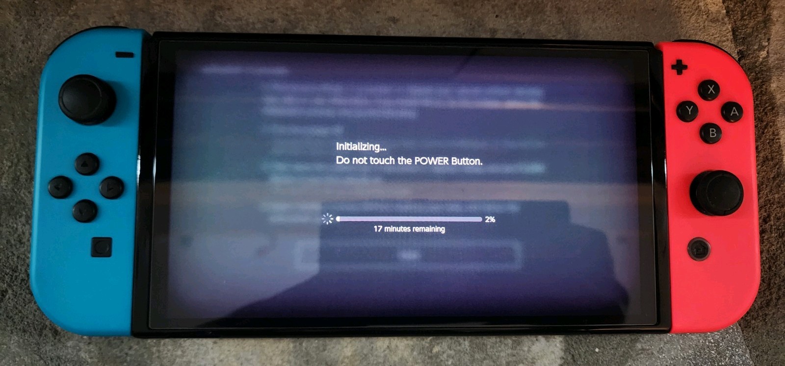Blue and Red Nintendo Switch OLED – comes wirh 128gb SD card