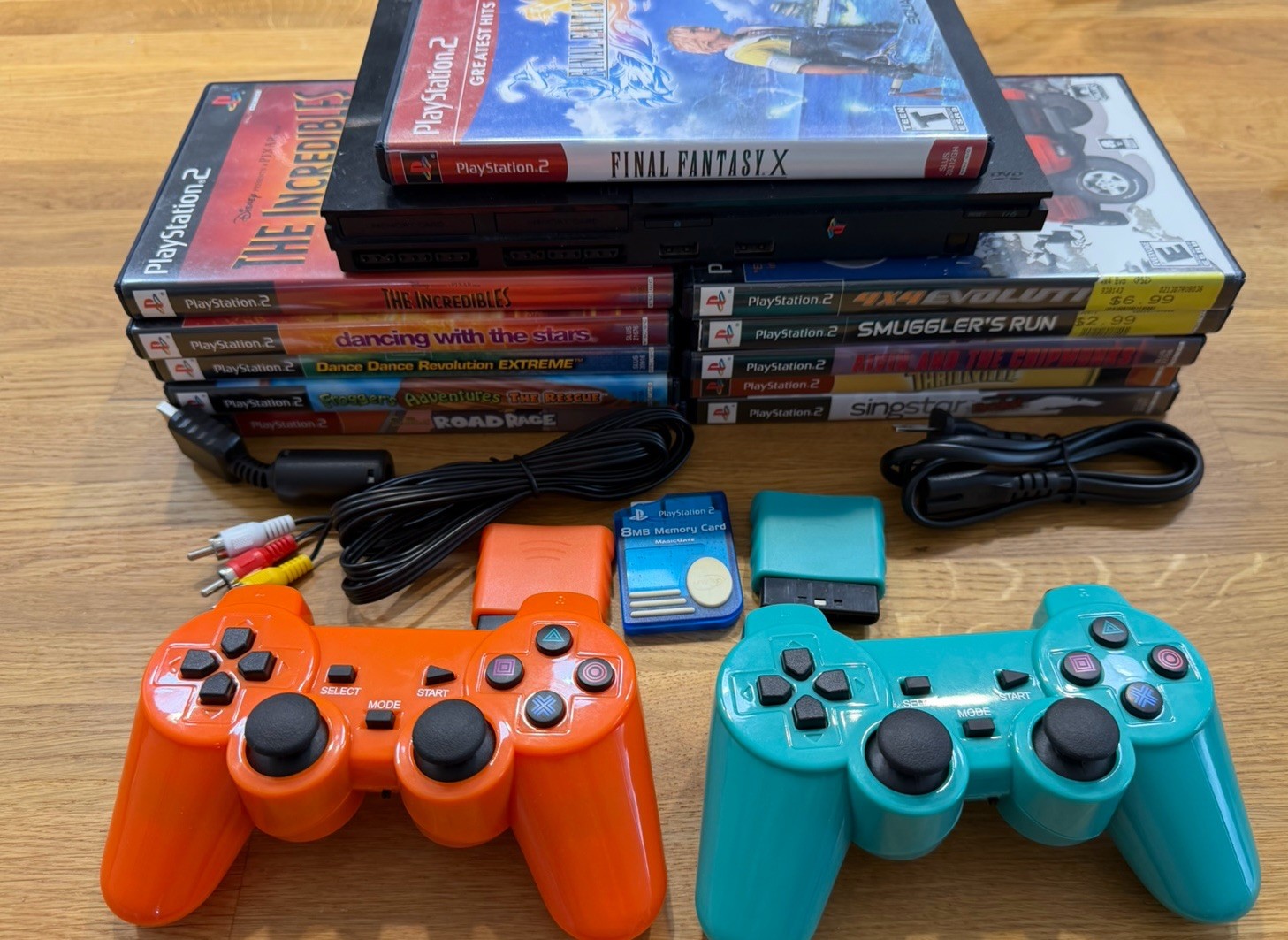 Sony PlayStation 2 – Slim Bundle 11 Games 2 Wireless Controllers