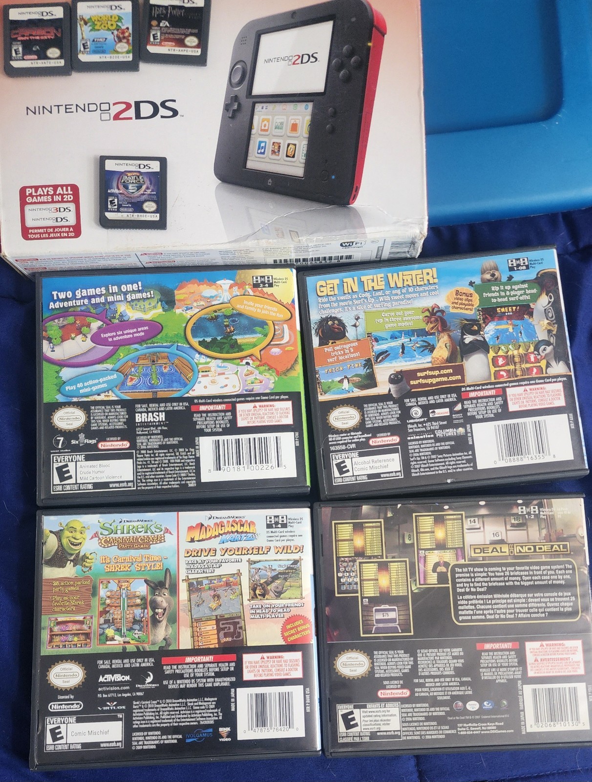 2ds console with 8 games ,box, Plastic Case, Everything Works
