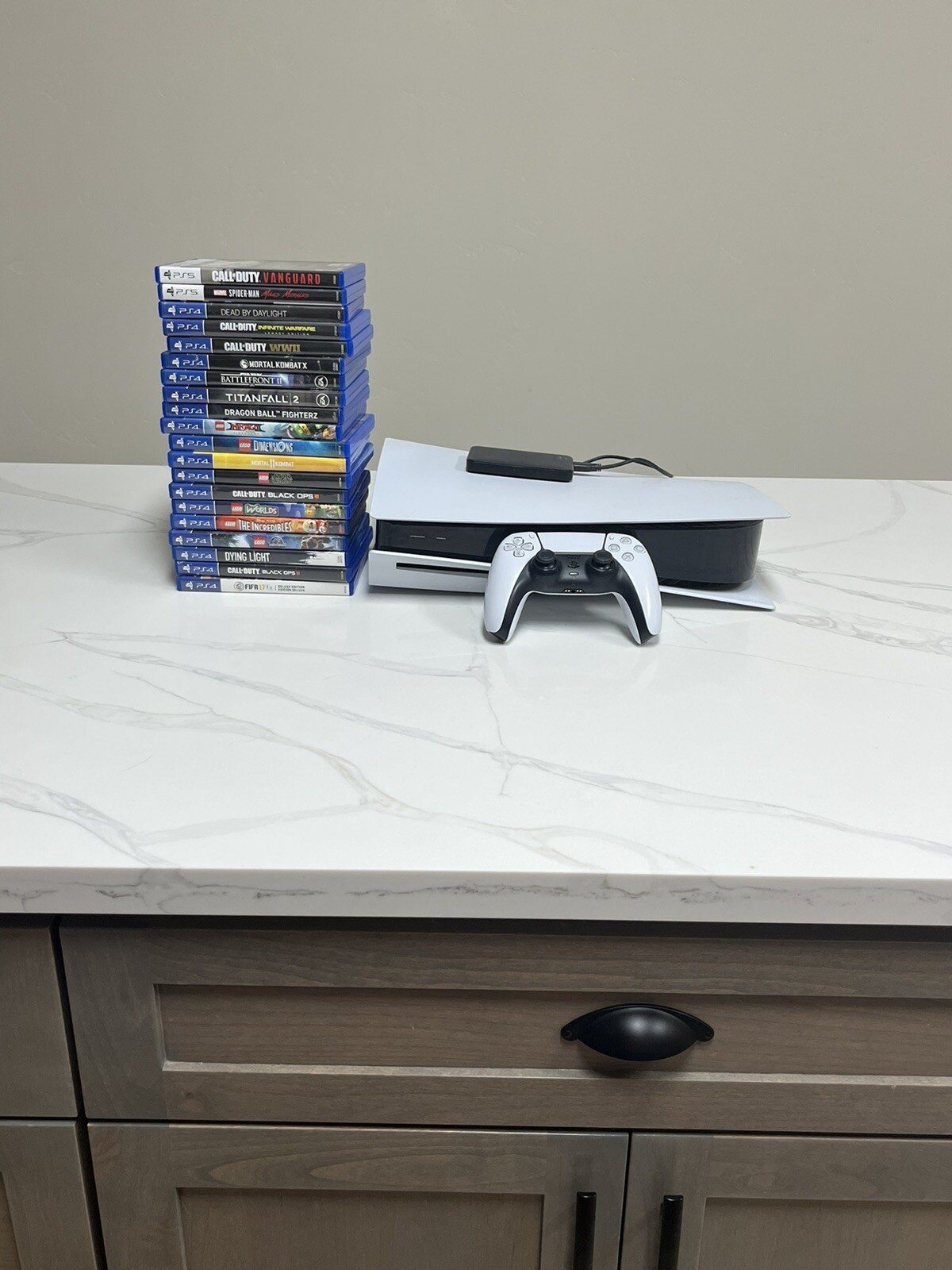 ps5 console disc version with games, controller, and 2Tb external hard drive