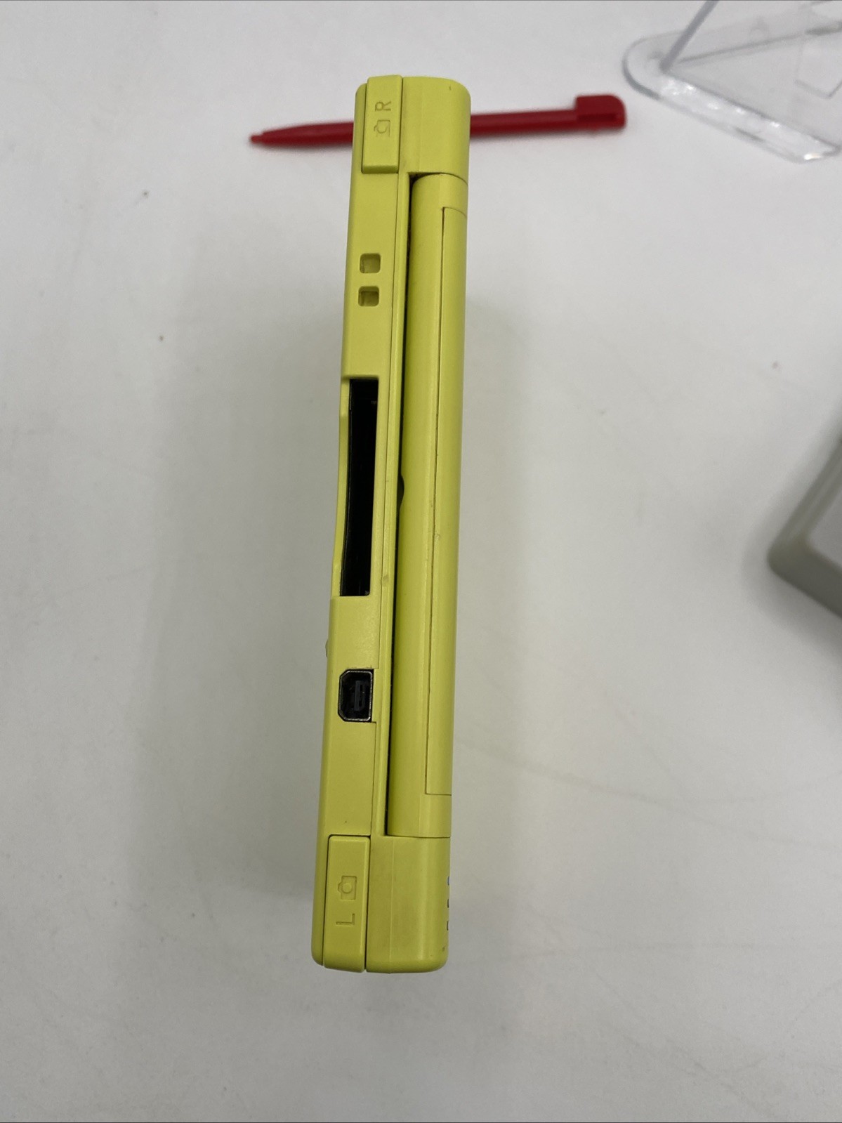 Nintendo DSi Yellow – Includes Preloaded Library (Large Collection)