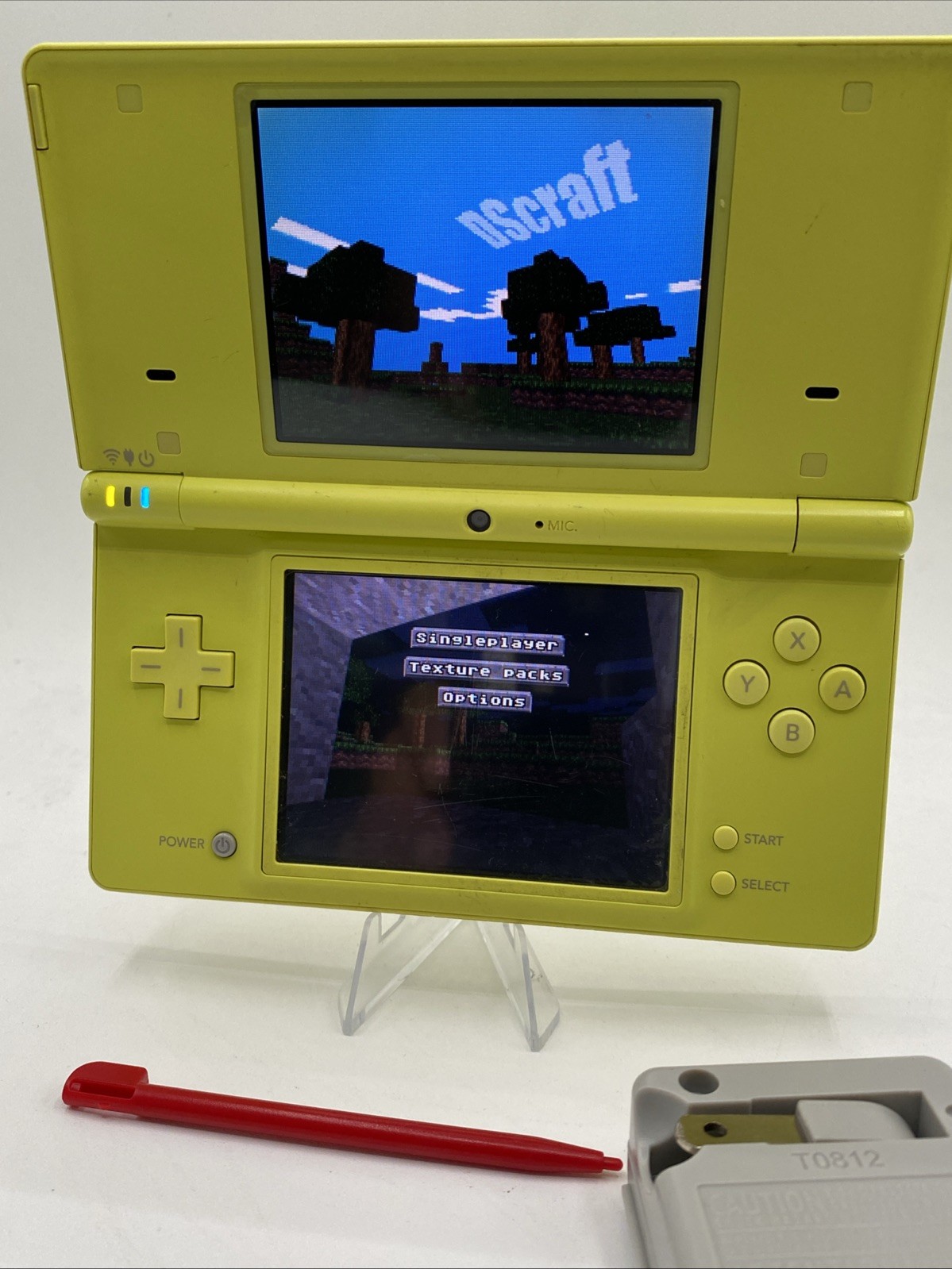 Nintendo DSi Yellow – Includes Preloaded Library (Large Collection)