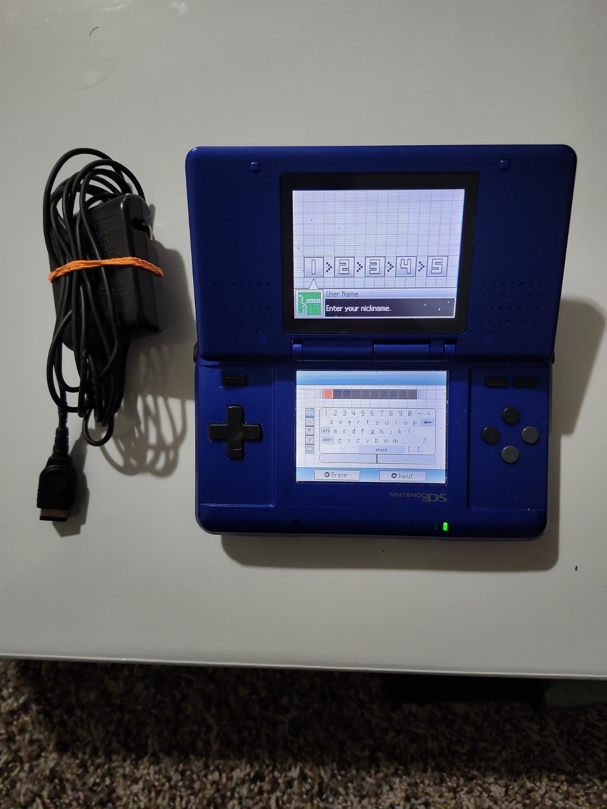Nintendo DS Launch Edition Electric Blue Handheld System + Charger + Stylus