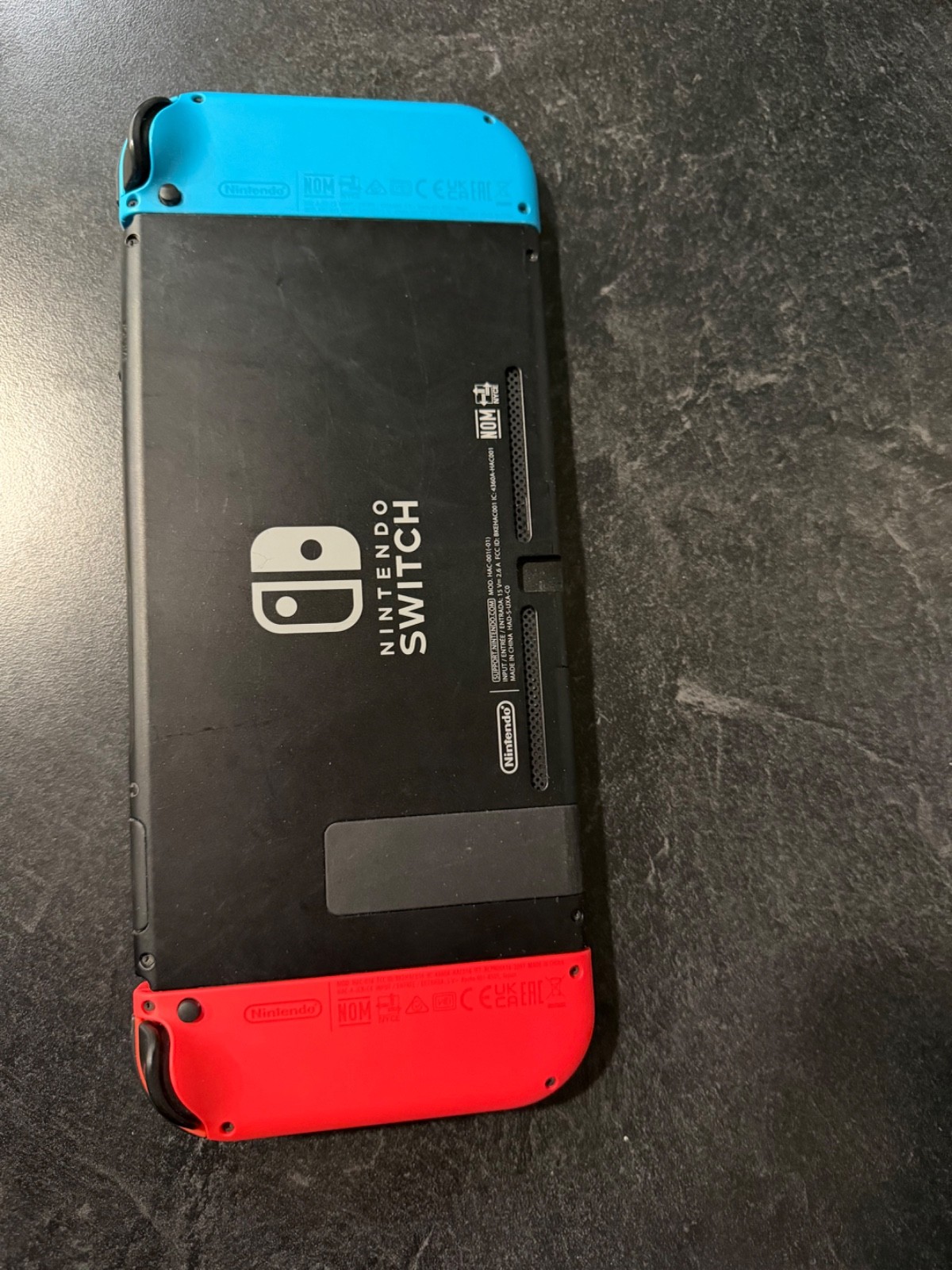 Nintendo Switch Console w Neon blue and red Joy-Con