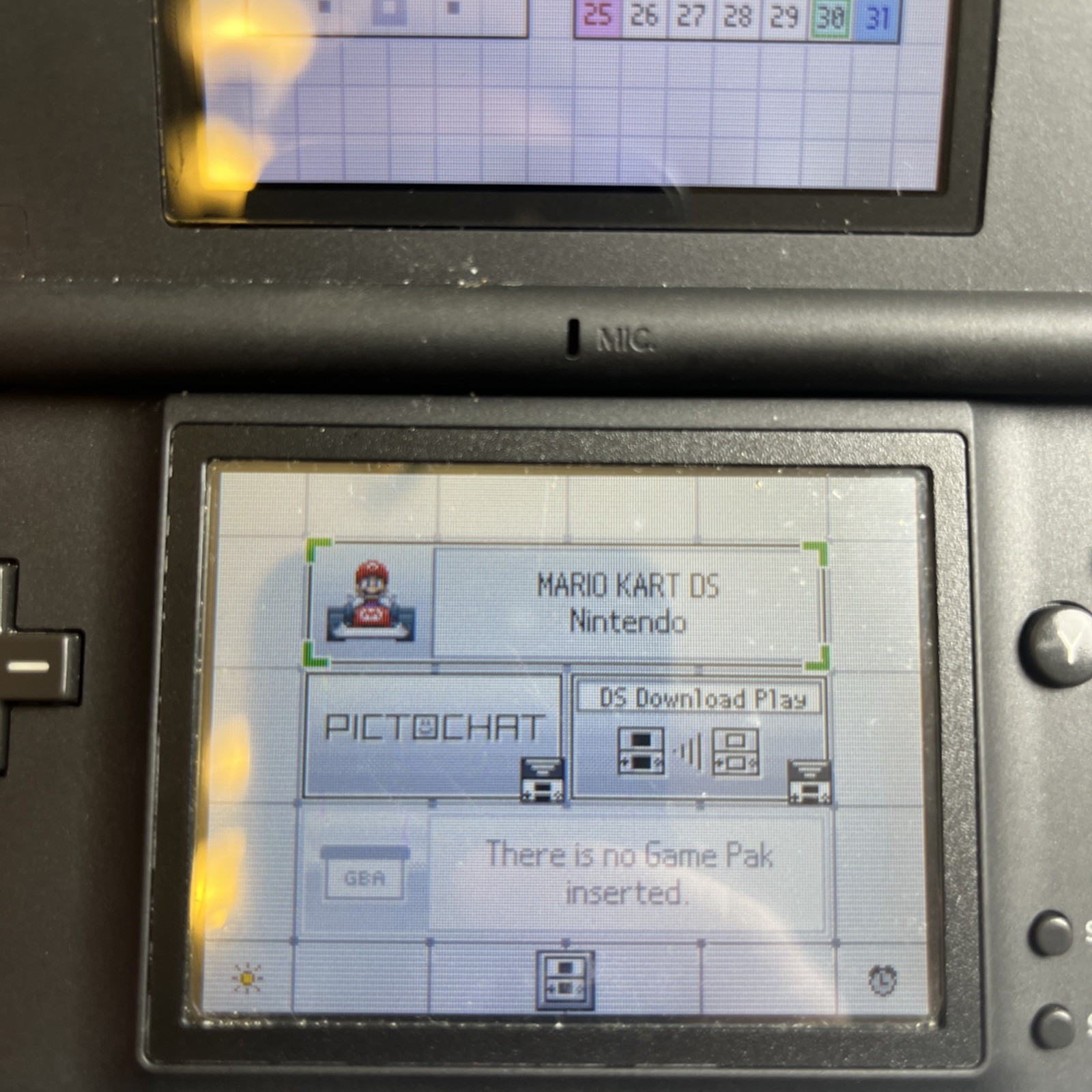 Nintendo DS Lite in Maroon with DS Lite With 5 Games