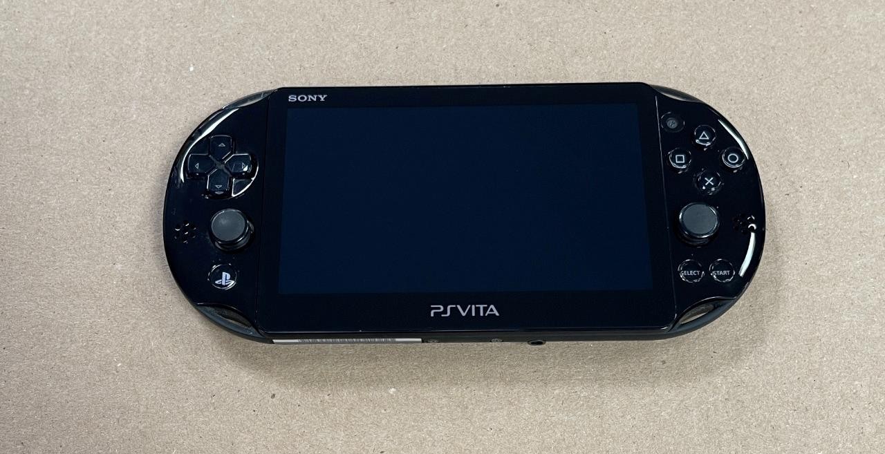SONY PS VITA PCH-2001 HANDHELD GAMING CONSOLE SYSTEM BLACK- USED.