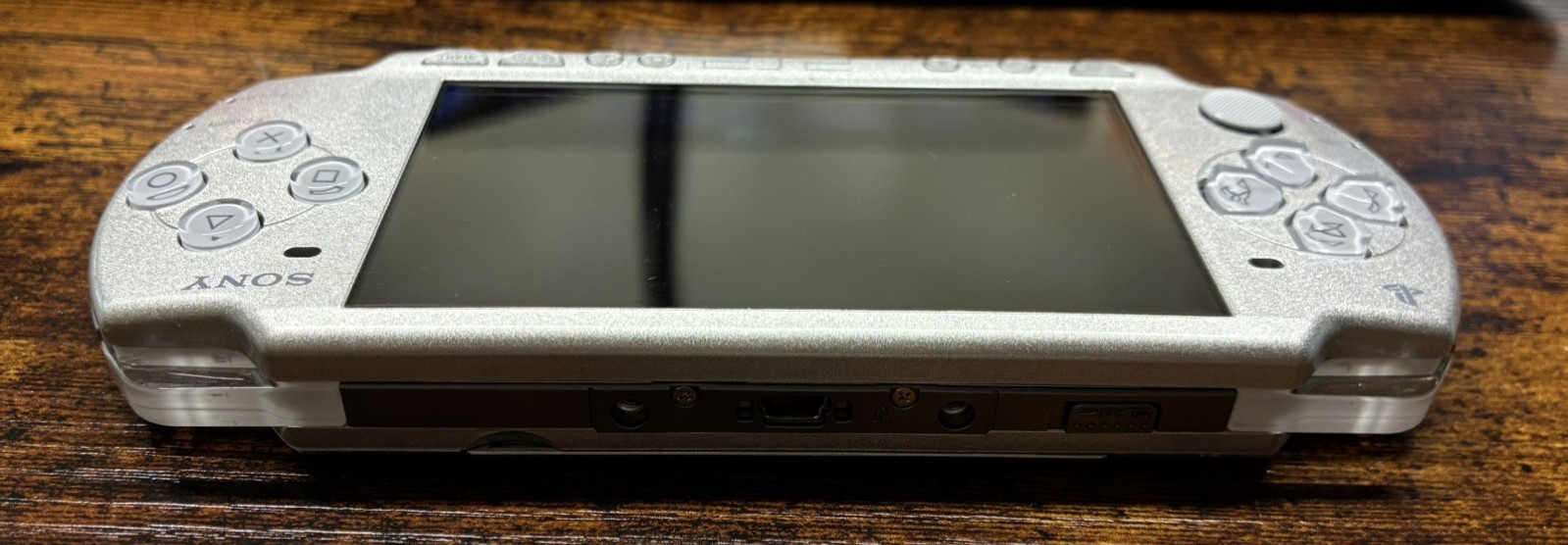 Sony PSP-2001 Silver Console NEW-Barely Used w/New Battery/Charger + 3 UMDs