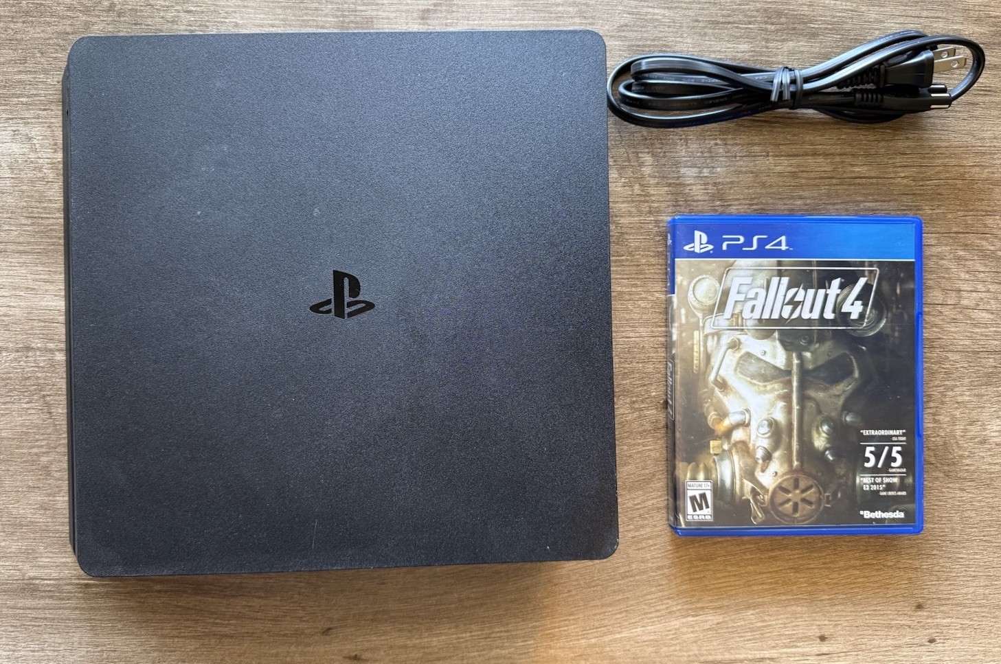 Sony PlayStation 4 Slim 1TB Console – Jet Black + Game. CUH2115B