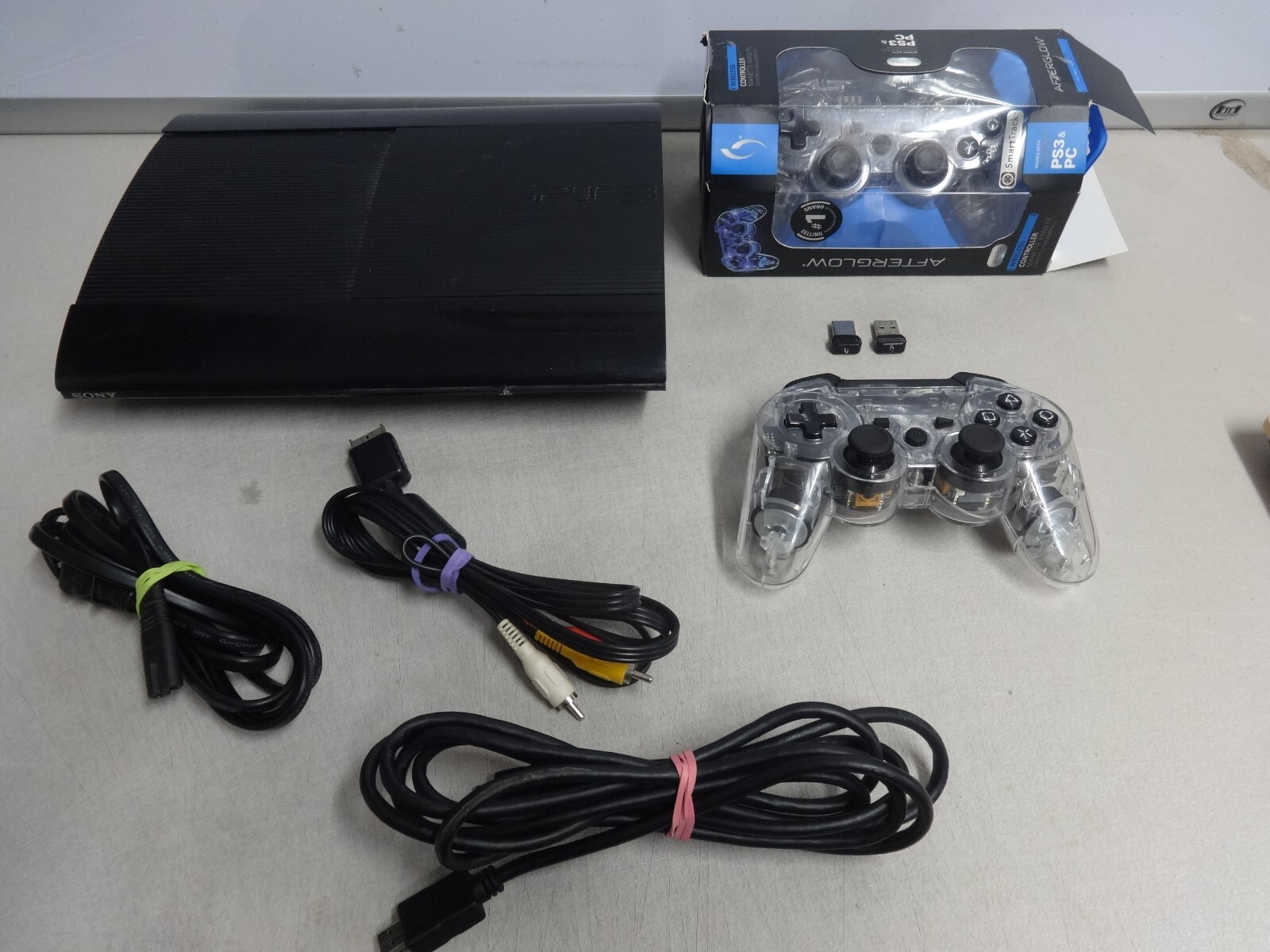 PS3 Super Slim 12GB CONSOLE BUNDLE – Black Plus 2 Controller, & Cords CECH-4301A
