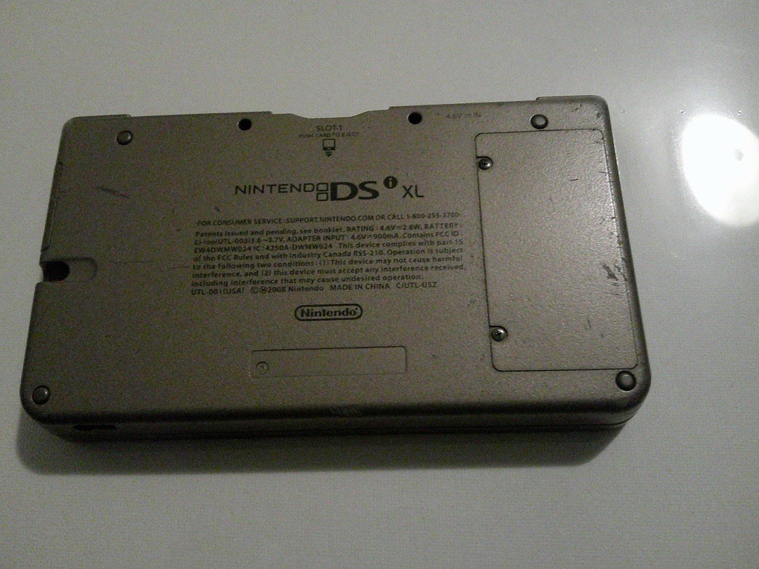 Nintendo DSi XL Black Handheld System for Nintendo DS Wi-Fi Camera Headphone