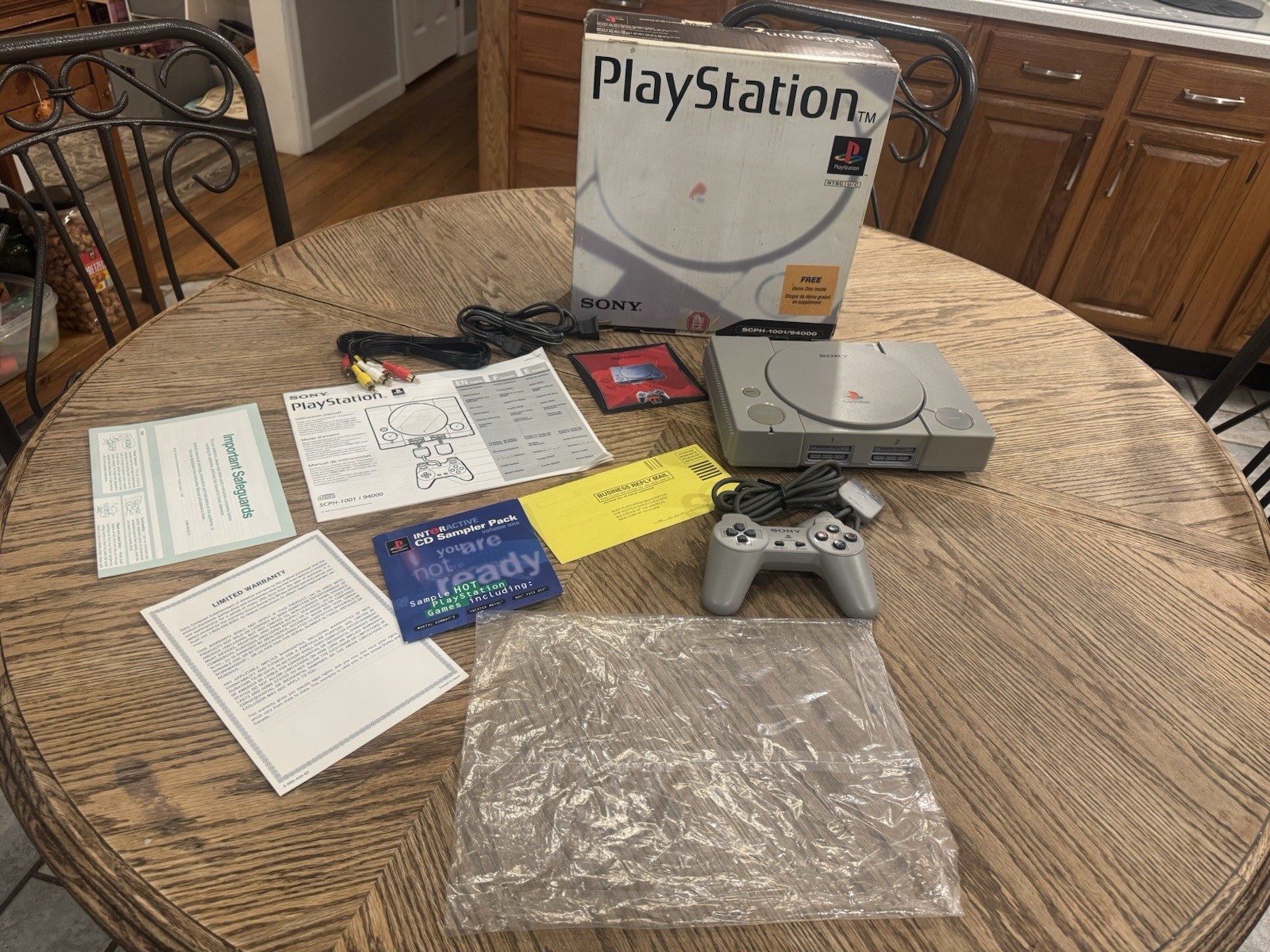 Sony PlayStation SCPH-1001 CIB Console with Controller, Manuals, CD Sampler