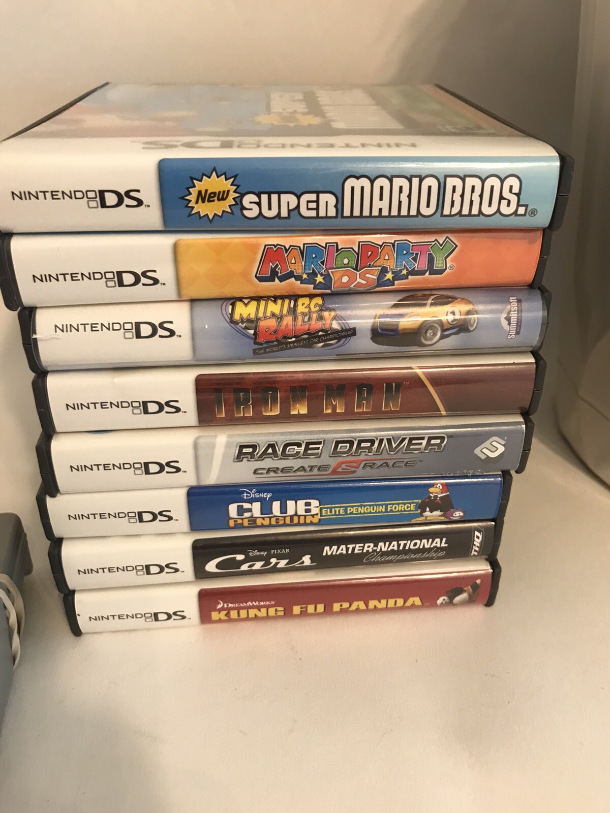 Nintendo DSi Handheld Game Console – White- with charger and 8 games
