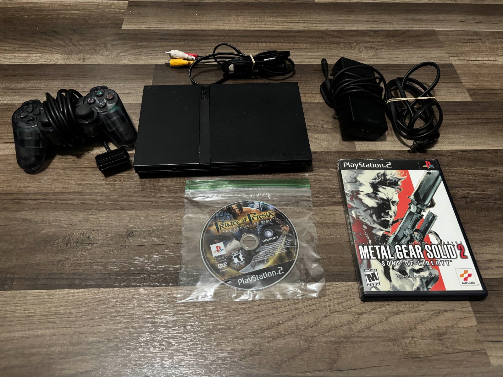 Sony Playstation 2 Slim COMPLETE with Metal Gear Solid 2 and Prince of Persia