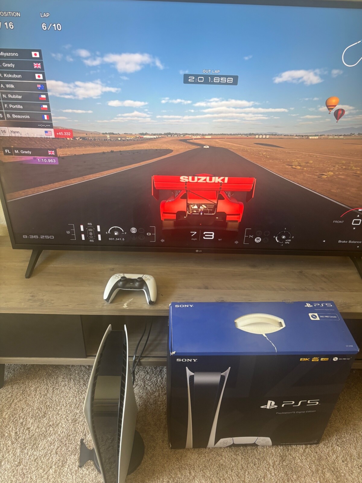 Sony PS5 Digital Edition Console – White with controller and Gran turismo 7