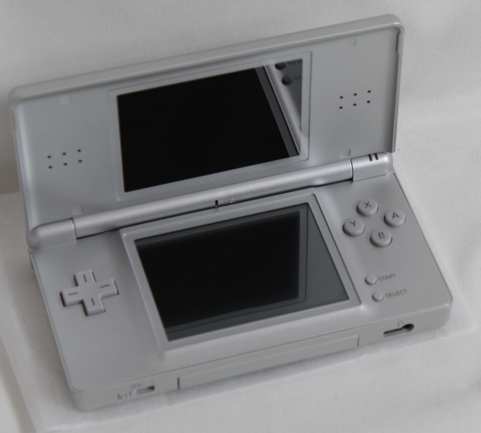 Nintendo DS Lite Handheld System Silver Never Used Never Played UNUSED/NEW COND.
