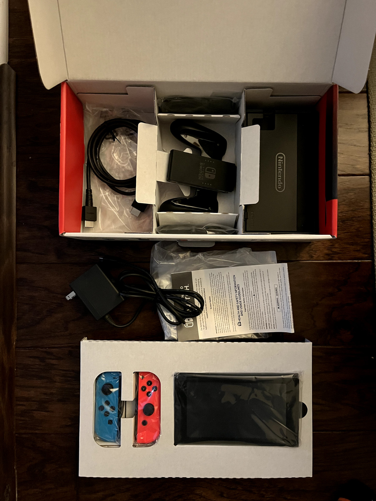 Nintendo Switch 32GB Handheld Console – Neon Red/Neon Blue