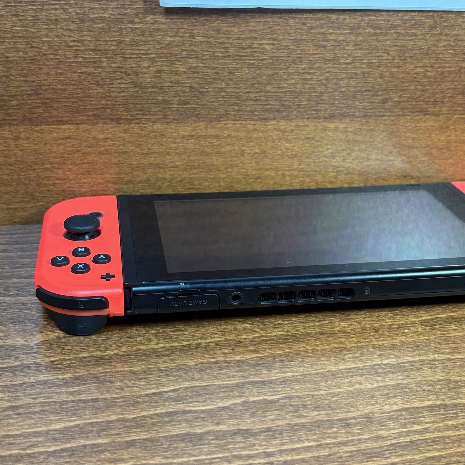 Nintendo Switch with Neon Red Joy-Cons | Works Perfectly | New Red Grip Included