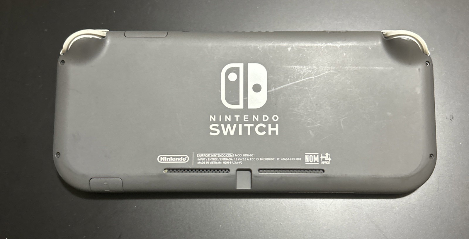 Nintendo Switch Lite – Gray (light scratches on screen)