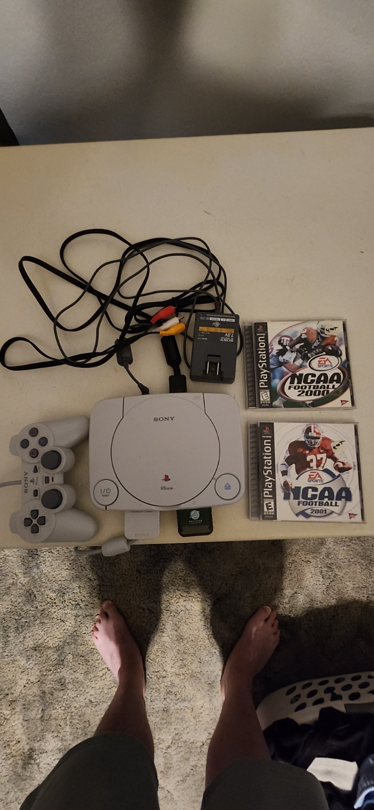 Sony PlayStation Console in very good ondition, and with a couple games.