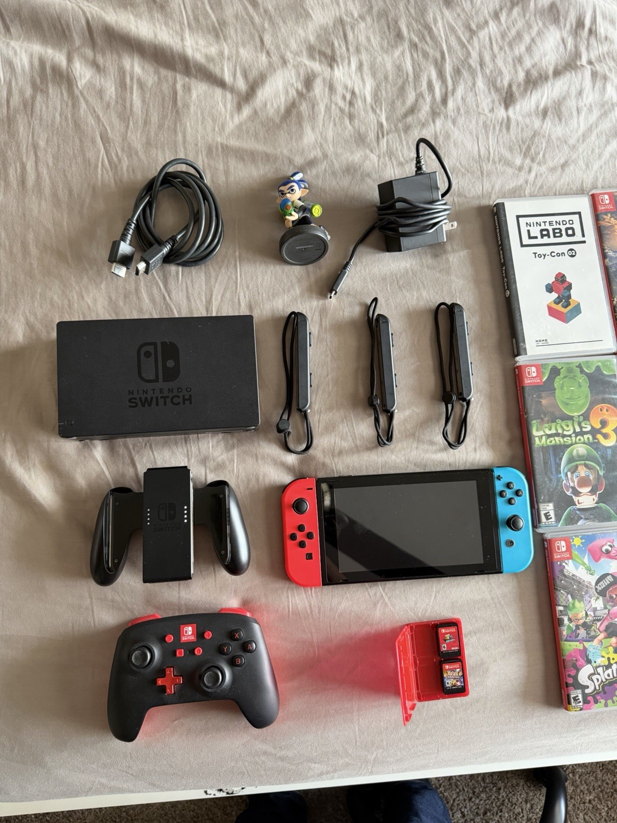 Nintendo Switch w/ 13 games, controllers, amiibo & extras