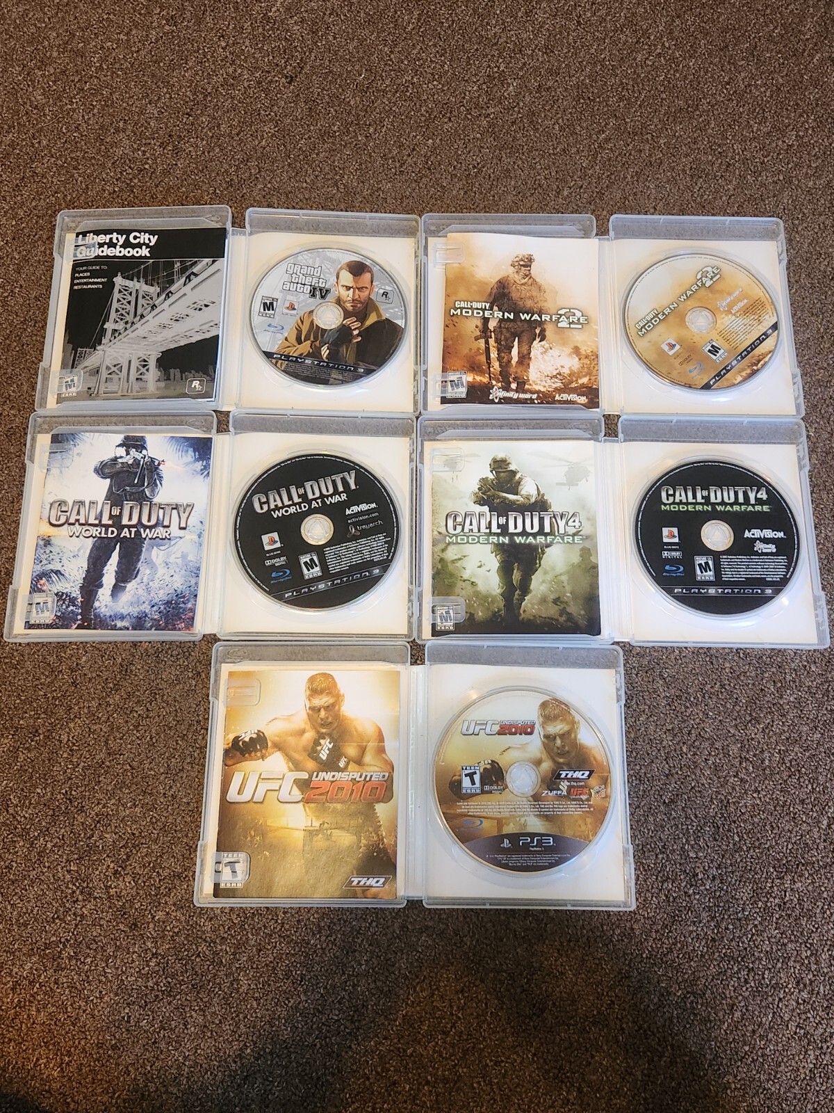 Sony PS3 (CECH-2001A) Bundle (12 games, 2 controllers, 1 Padded Travel Bag)