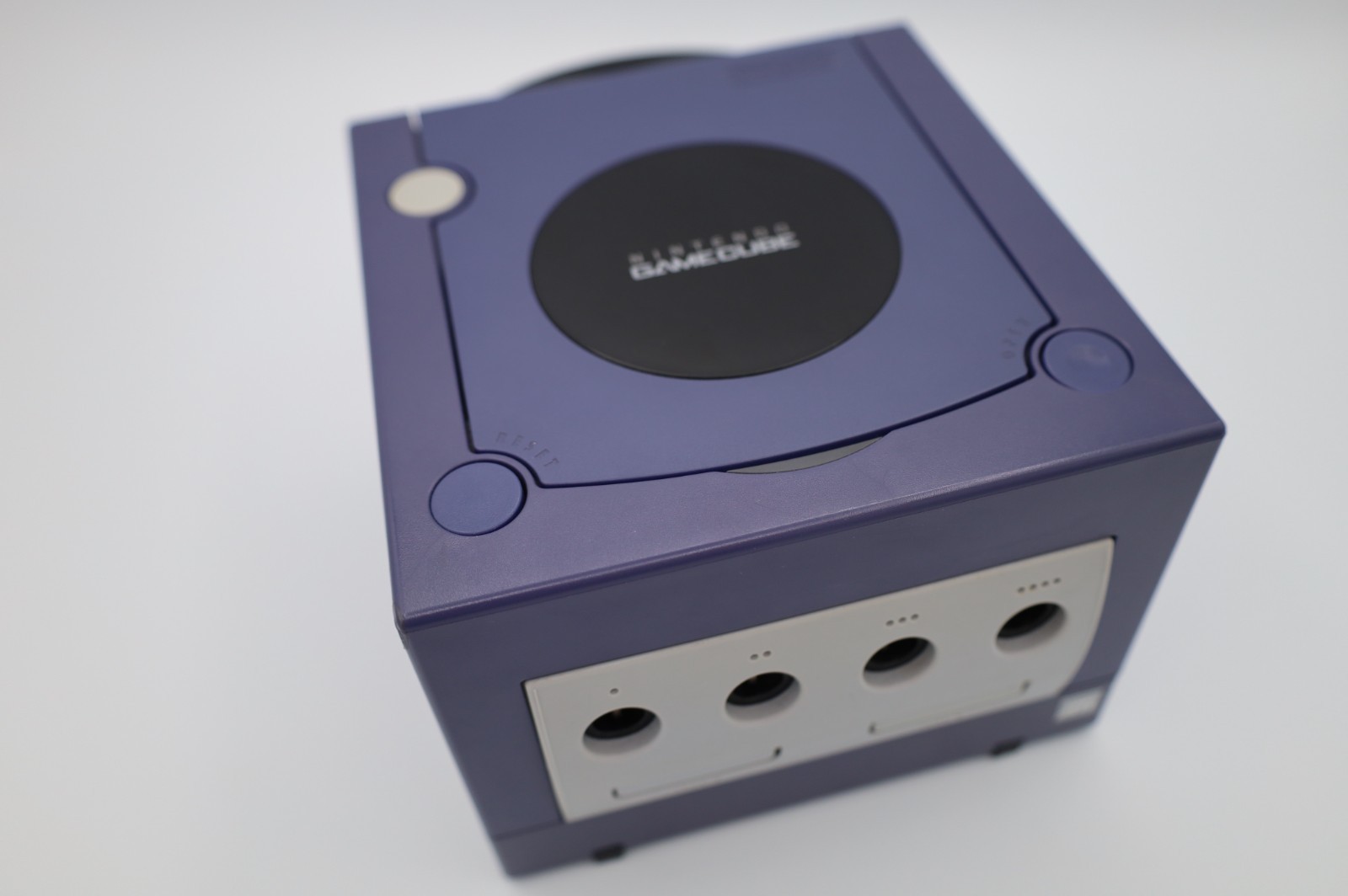 Nintendo GameCube Indigo console with original box, power adapter, and AV cable