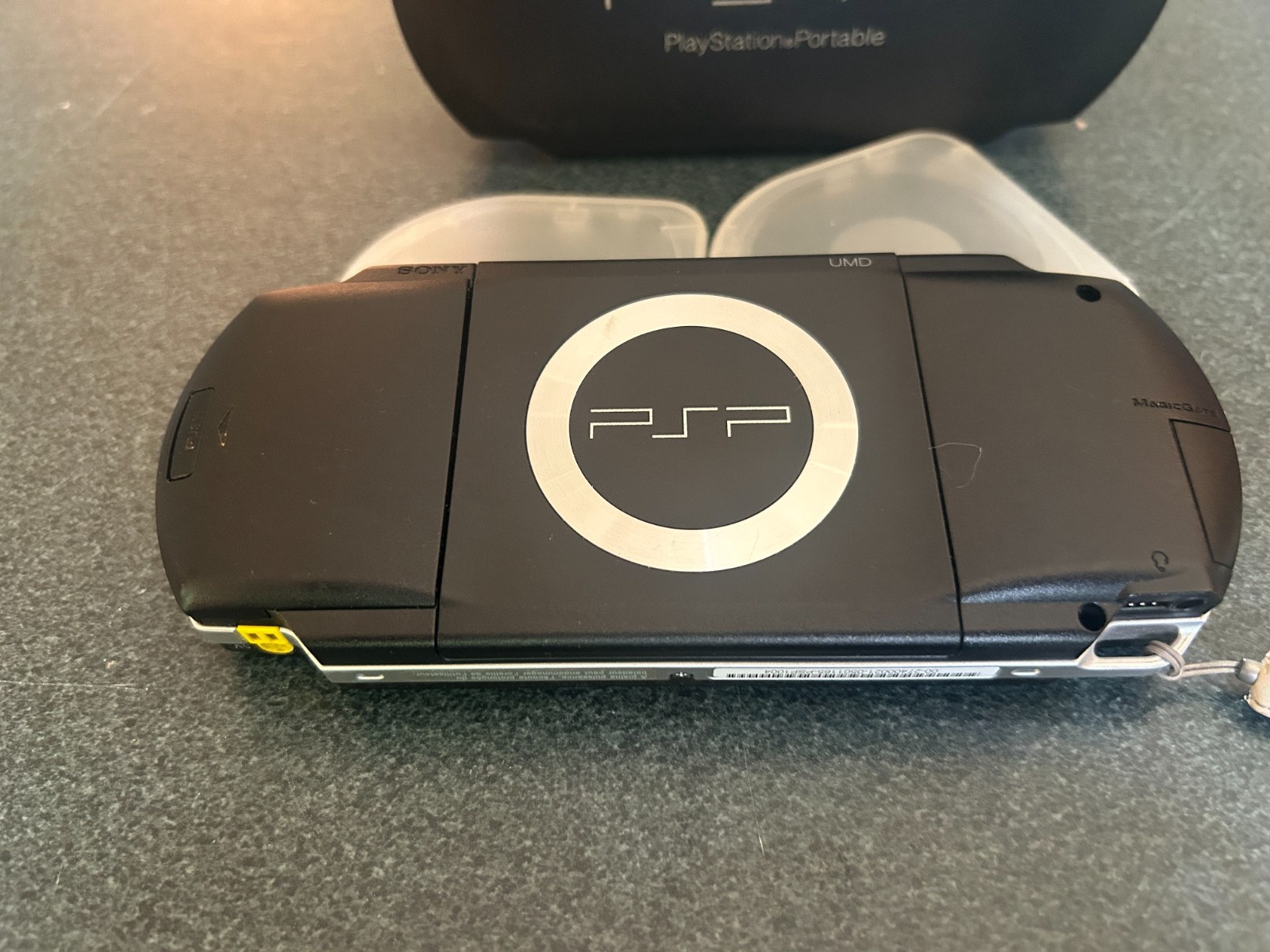 Sony PlayStation Portable console PSP-1004 with 8 games & 3 memory sticks