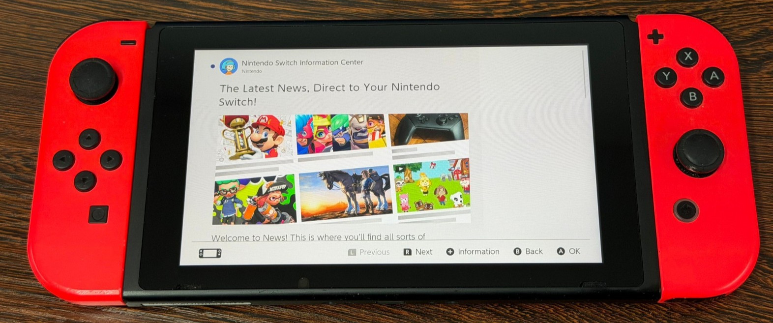 Nintendo Switch Handheld Console – Neon Red JoyCons – Excellent Condition