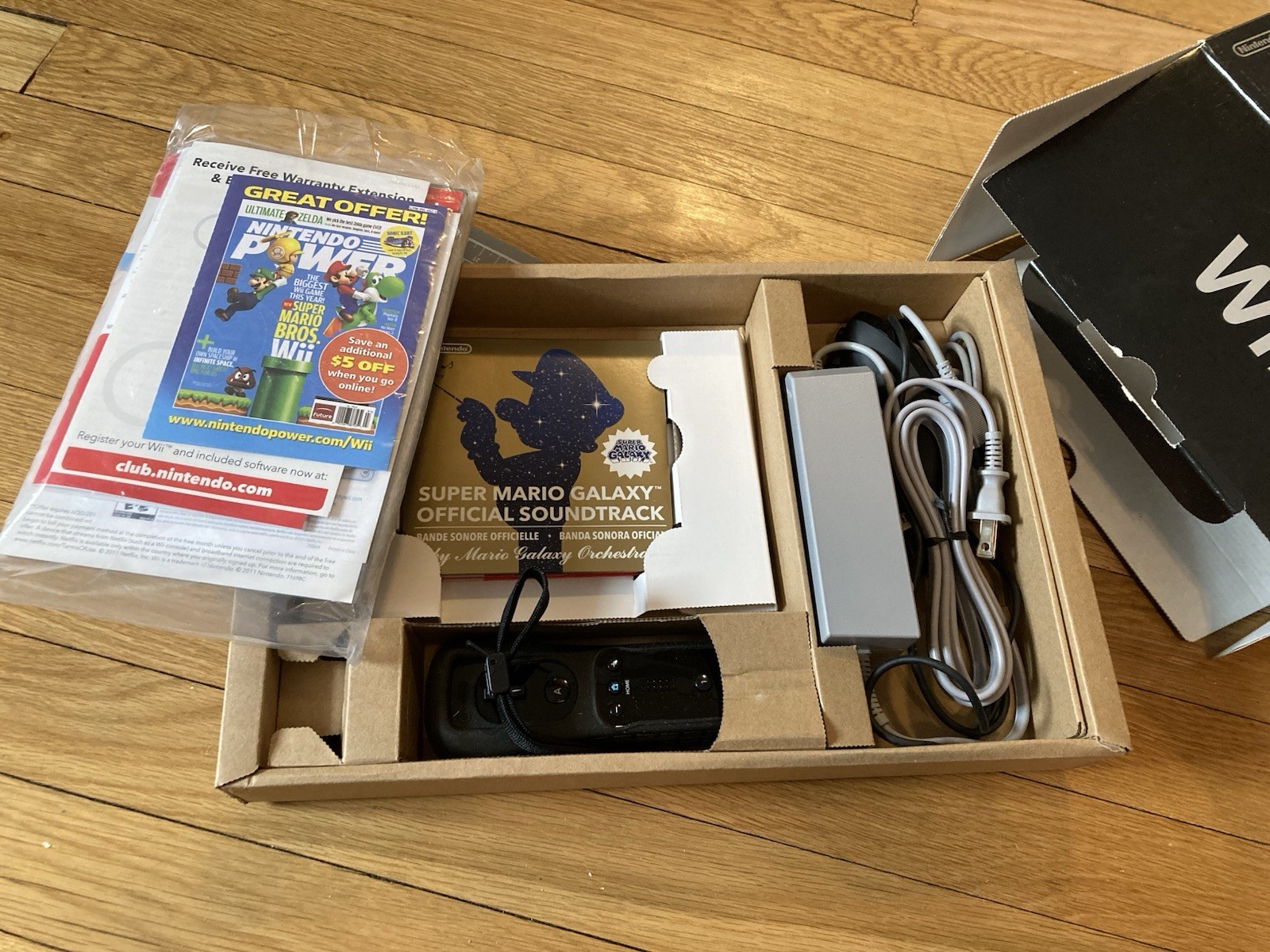 NEW Black Nintendo Wii Open box, includes Super Mario Bros. Wii