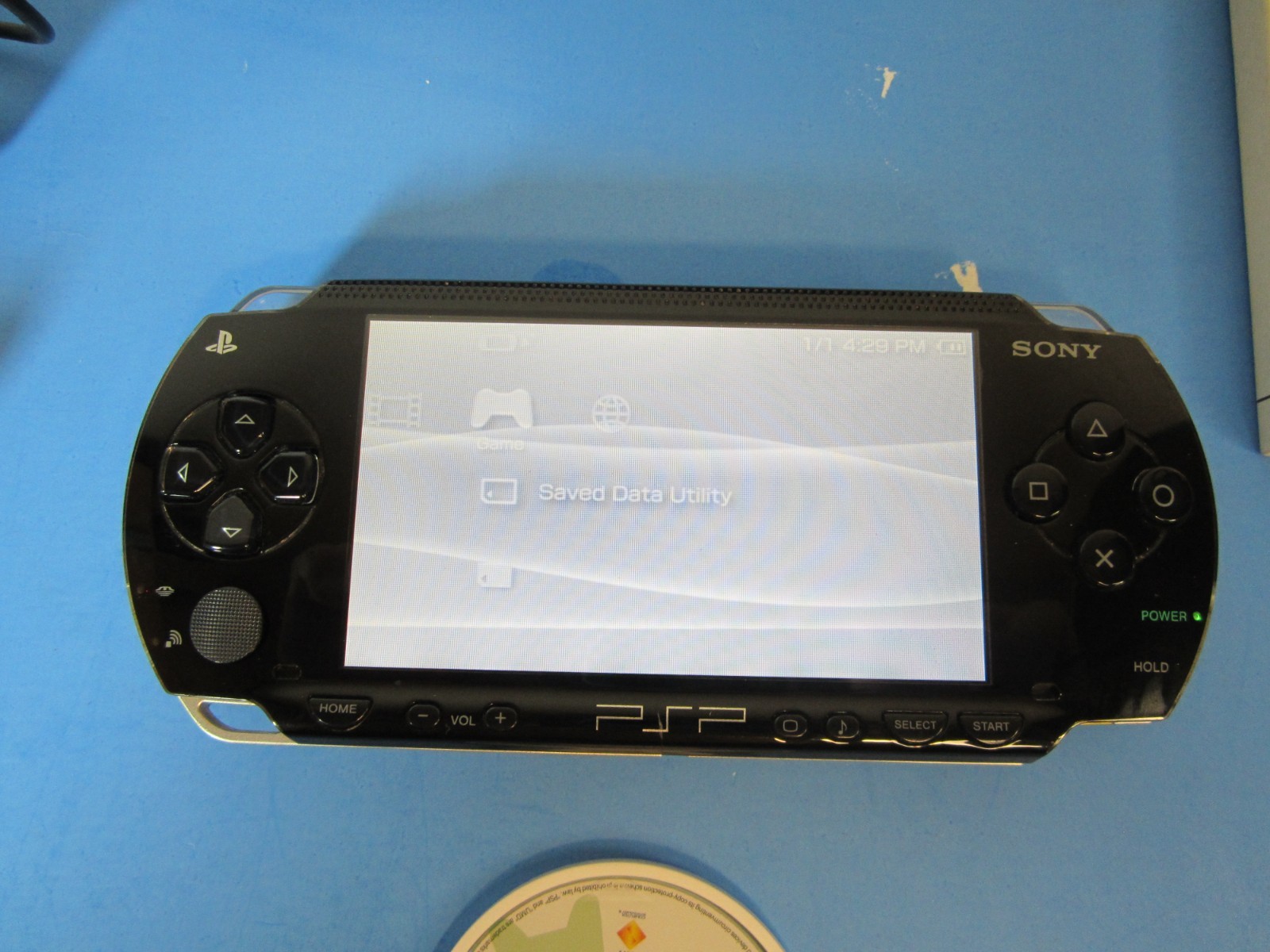 SONY PSP-1001 Black Console Bundle 7-Games with manuals & accessories *TESTED*