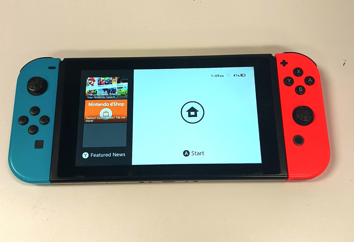 Nintendo Switch Console w/ Dock Neon Red/Blue Joy-Con Case 128GB microSD