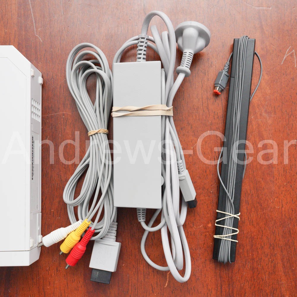 Nintendo Wii White Console Bundle – 2 Remotes, Nunchuk, Sensor Bar & 3 Games