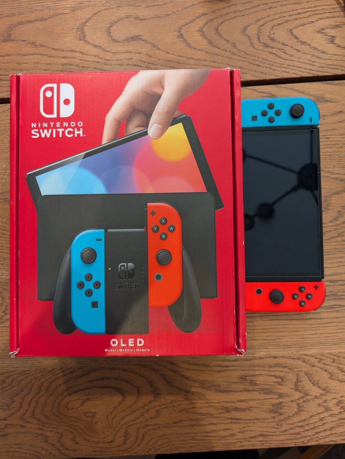 Nintendo Switch OLED Red Blue in Excellent Condition w/ Games, Travel Case