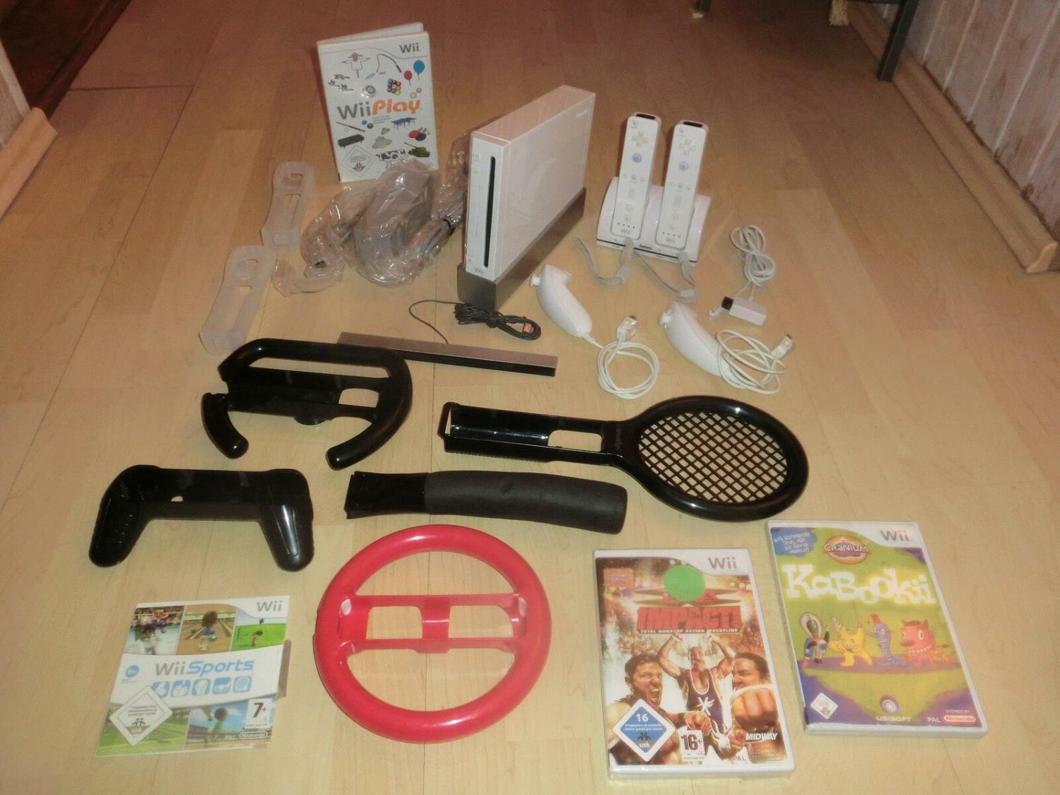 Nintendo Wii white, extensive mega set, 2 remotes, 4 games, 1 year warranty