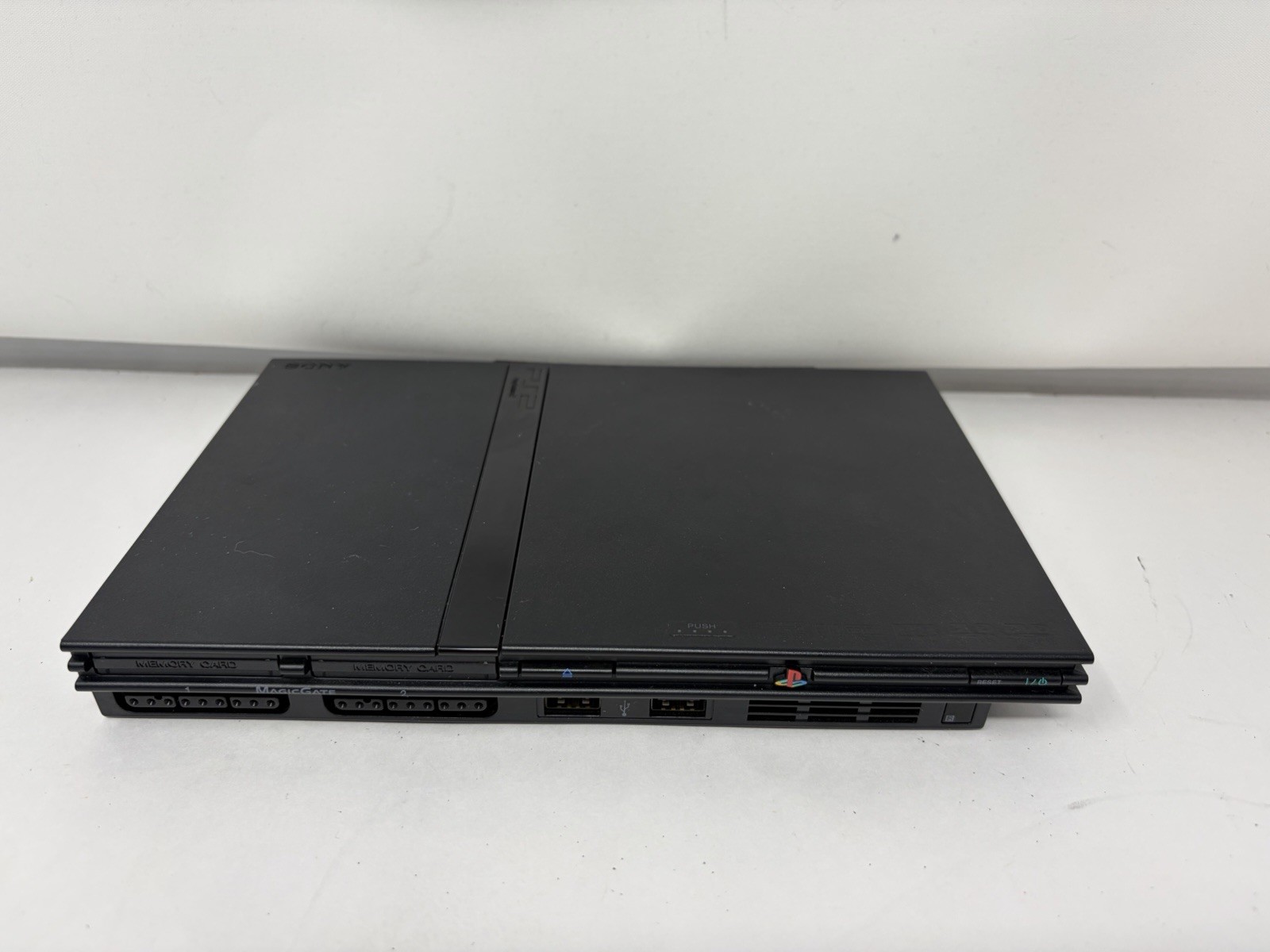 Sony PlayStation 2 Slim Line Version 1 Console – Charcoal Black (SCPH-70012)