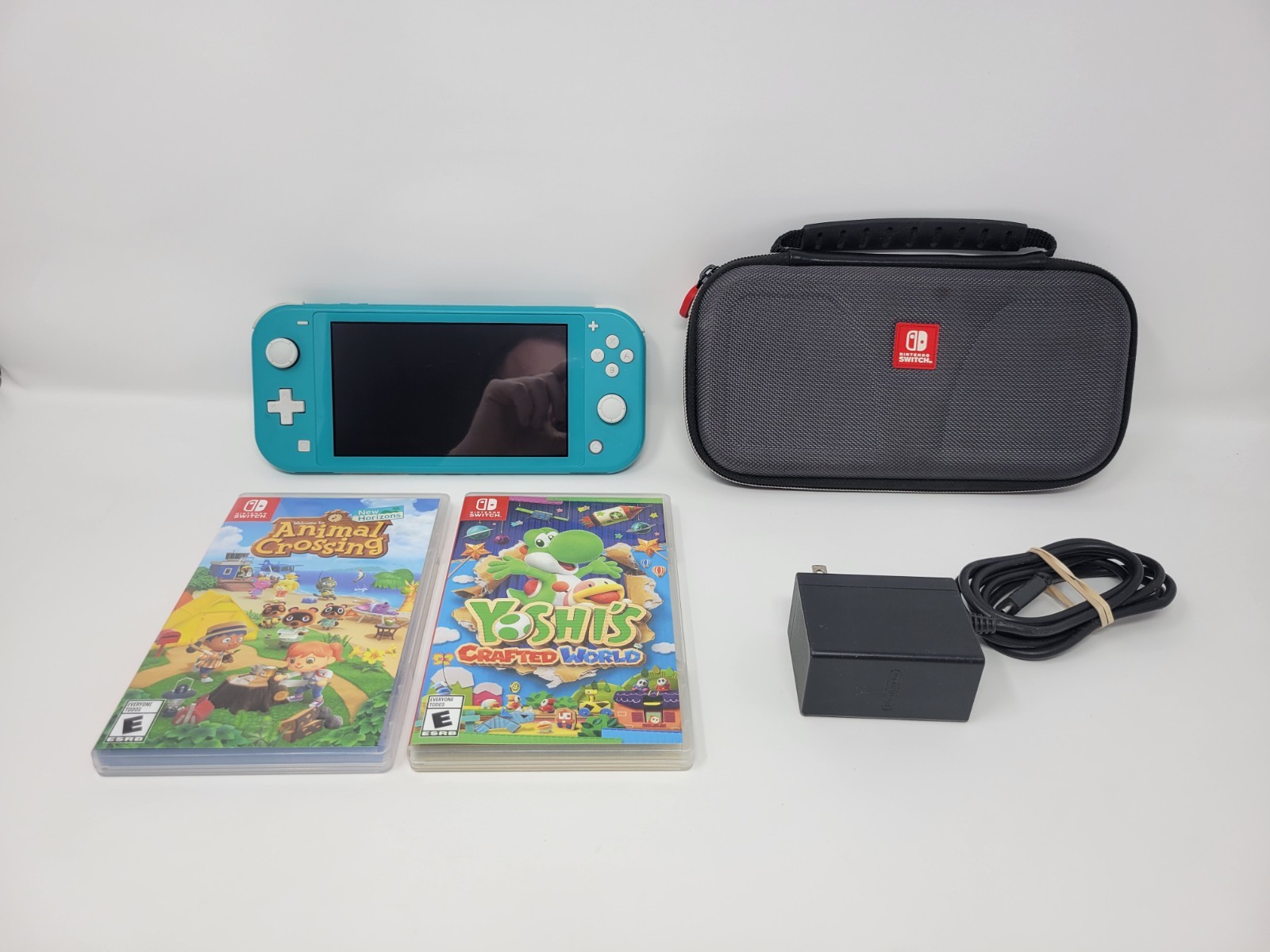 Nintendo Switch Lite 32GB Console Turquoise w/ Case + Animal Crossing + Yoshi